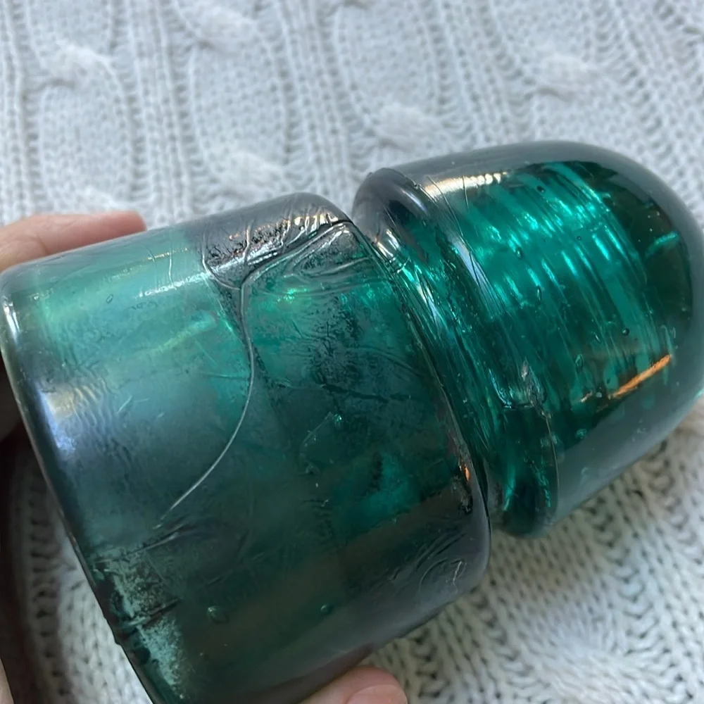 Antique glass insulator. Aqua teal glass. Threads inside stamped B on outside